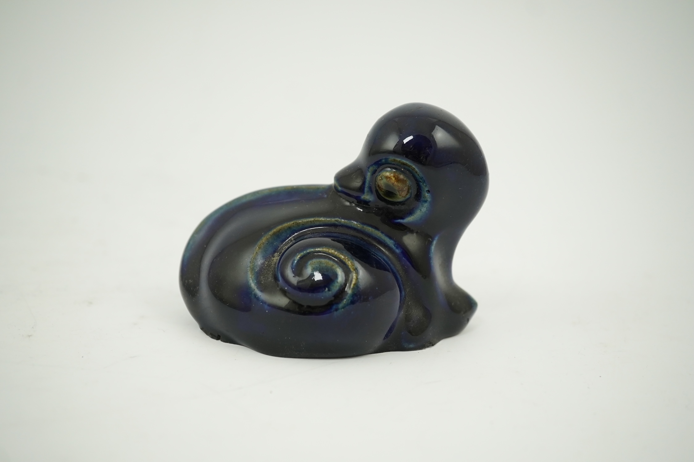 A Royal Doulton stoneware grotesque blue glazed 'duck' by Mark V. Marshall, 9cm wide. Condition - good